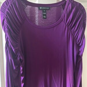 Purple gathered sleeve jersey top.
